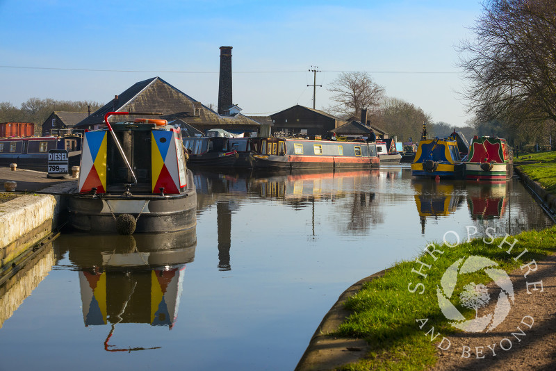Canal boats moored at Norbury Junction on the Shropshire Union Canal, Staffordshire, England.