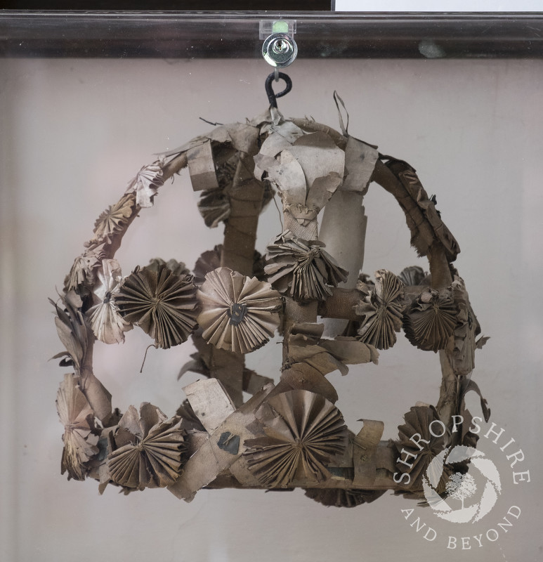 An 18th century maiden's garland on display in Holy Trinity Church, Minsterley, Shropshire.