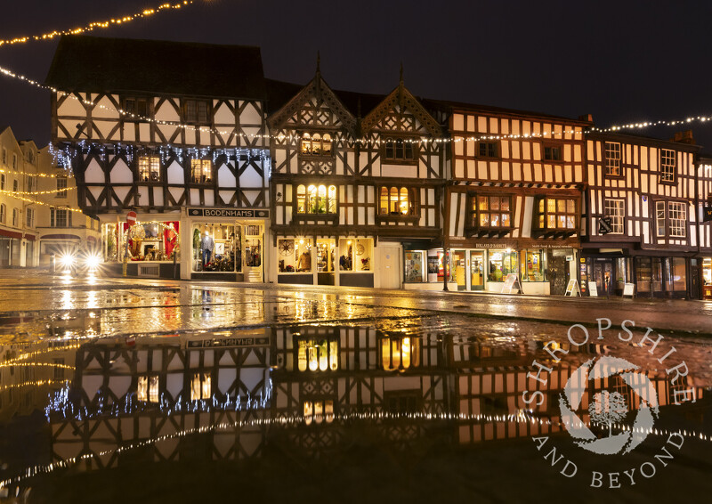 Christmas reflections in Broad Street, Ludlow, Shropshire.