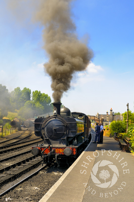 A GWR 5700 class pannier tank locomotive gets up steam at Bridgnorth Station, Severn Valley Railway, Shropshire, England.