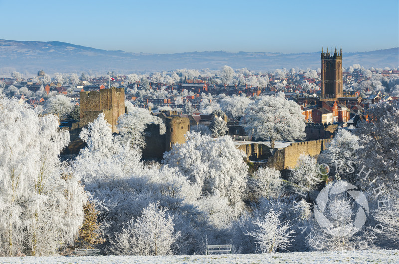 Hoar frost surrounds the market town of Ludlow in Shropshire, seen from Whitcliffe Common.