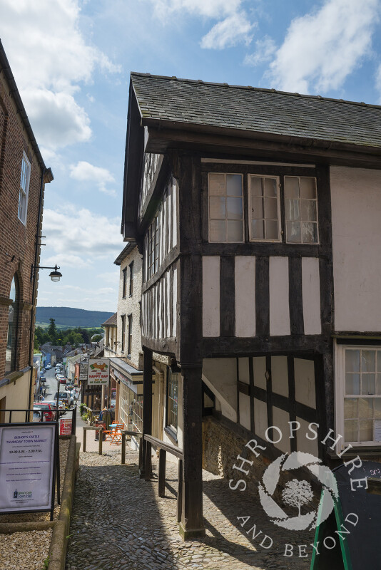 Sunlight and shadows outside the House on Crutches in Bishop's Castle, Shropshire.