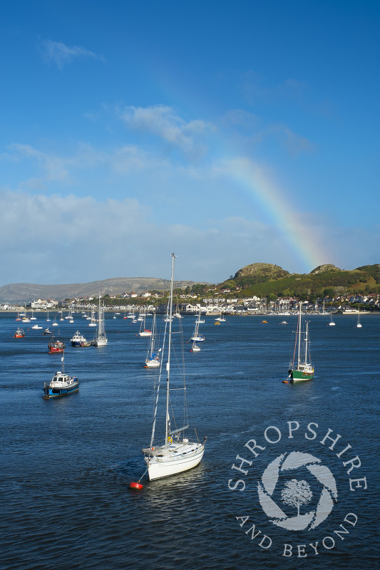 Rainbow over Conwy Bay, looking to Deganwy, Wales.