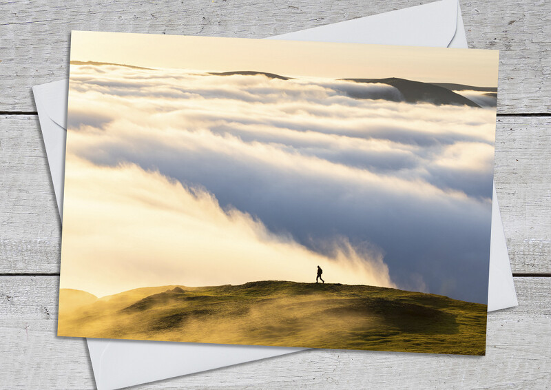 A lone walker at sunset on Caradoc, near Church Stretton, Shropshire.