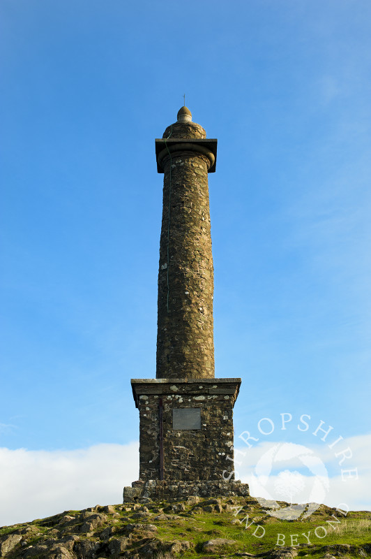 Blue skies over Rodney's Pillar on Breidden Hill, Powys, Wales.