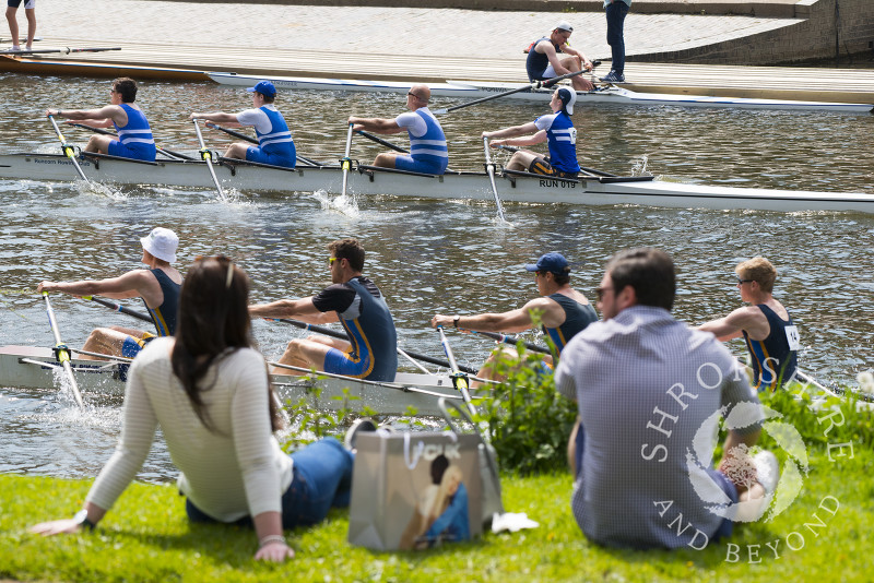 Spectators enjoy the spring sunshine at Shrewsbury Regatta on the River Severn, Shropshire.