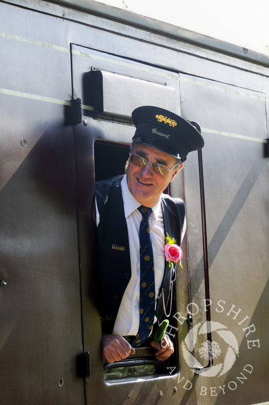A guard on the Severn Valley Railway at Hampton Loade, Shropshire, England.