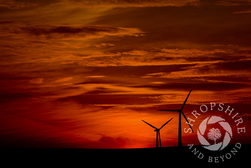 Sunset behind the wind farm at Carno in Powys, Mid Wales.