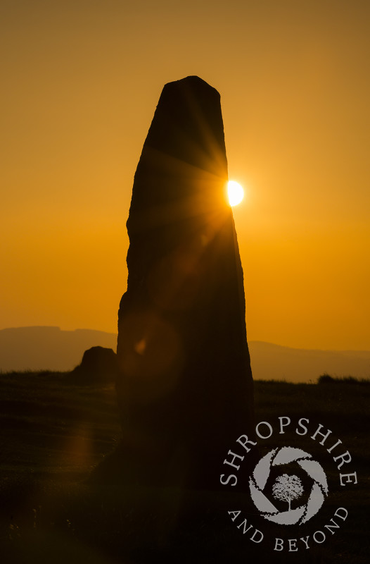 Sunset at Mitchell's Fold Stone Circle on Stapeley Hill near Priest Weston, Shropshire.
