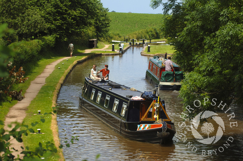 Canal boats on the Shropshire Union Canal at Tyrley Locks, near Market Drayton, Shropshire, England.