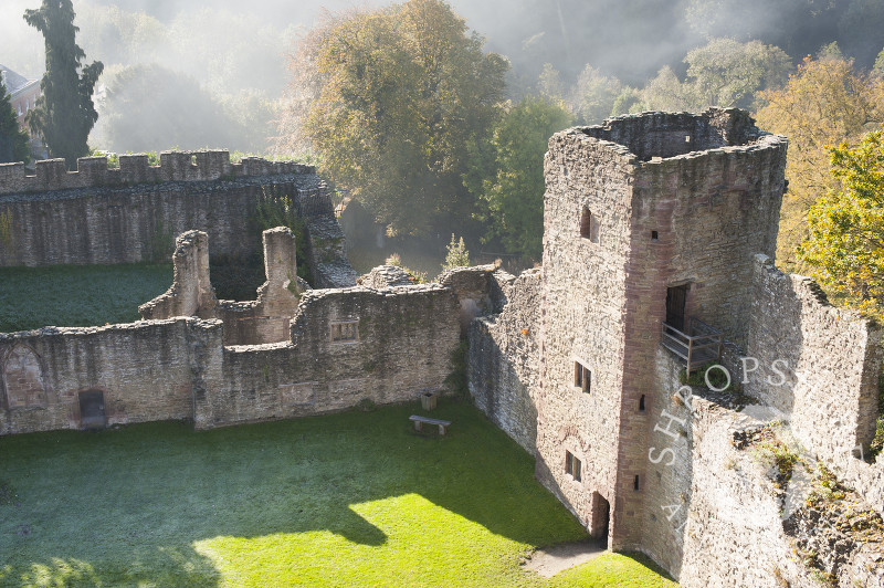 Smoke from a bonfire drifts across the grounds of Ludlow Castle, Shropshire, England.