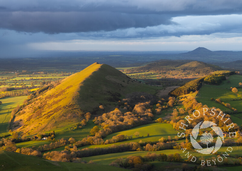 The Lawley at sunset with the Wrekin on the horizon, seen from Caradoc, Shropshire.