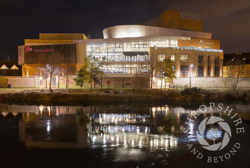 Theatre Severn reflected in the River Severn at Shrewsbury, Shropshire.