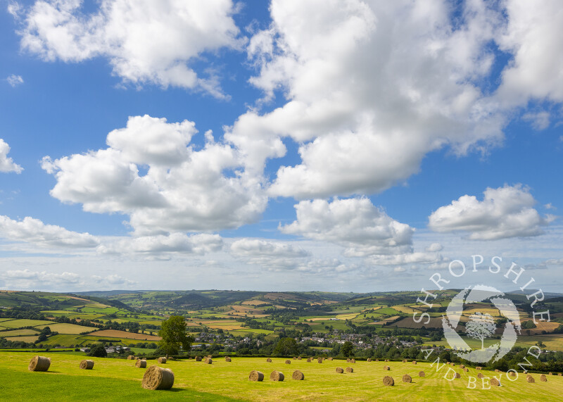 Hay bales overlooking the town of Clun in south Shropshire.